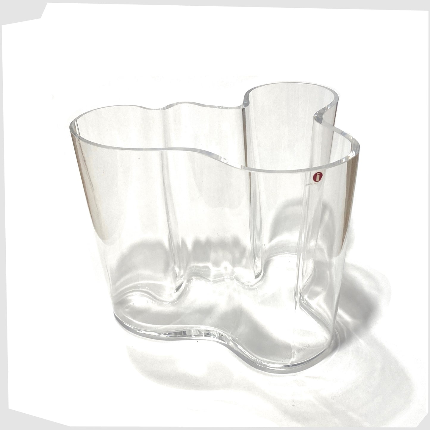large iittala savoy vase designed by Alvar Aalto, clear glass vase with iconic waved edge, 160mm in size complete with original 'i' label on the front rim