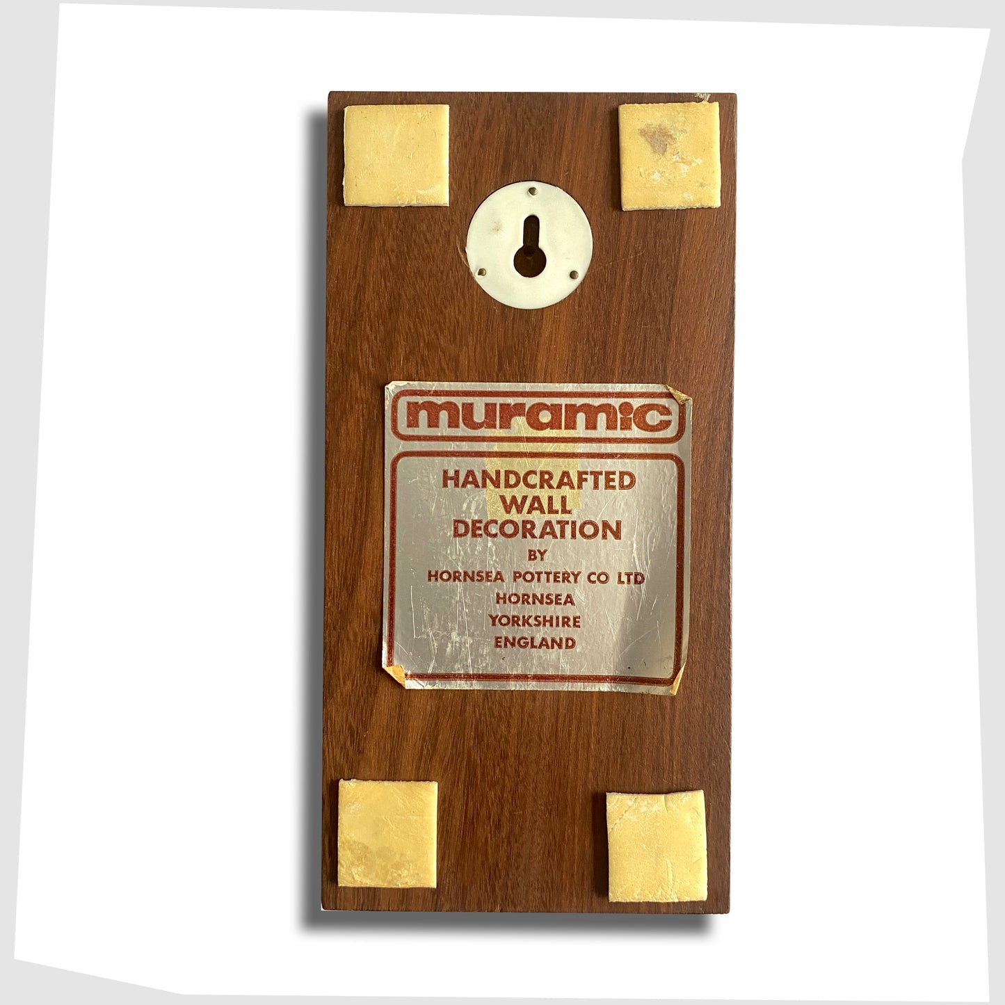 rear label of the Hornsea Pottery Muramic Wall Plaque of Napoleon, ceramic tiles on wooden plaque