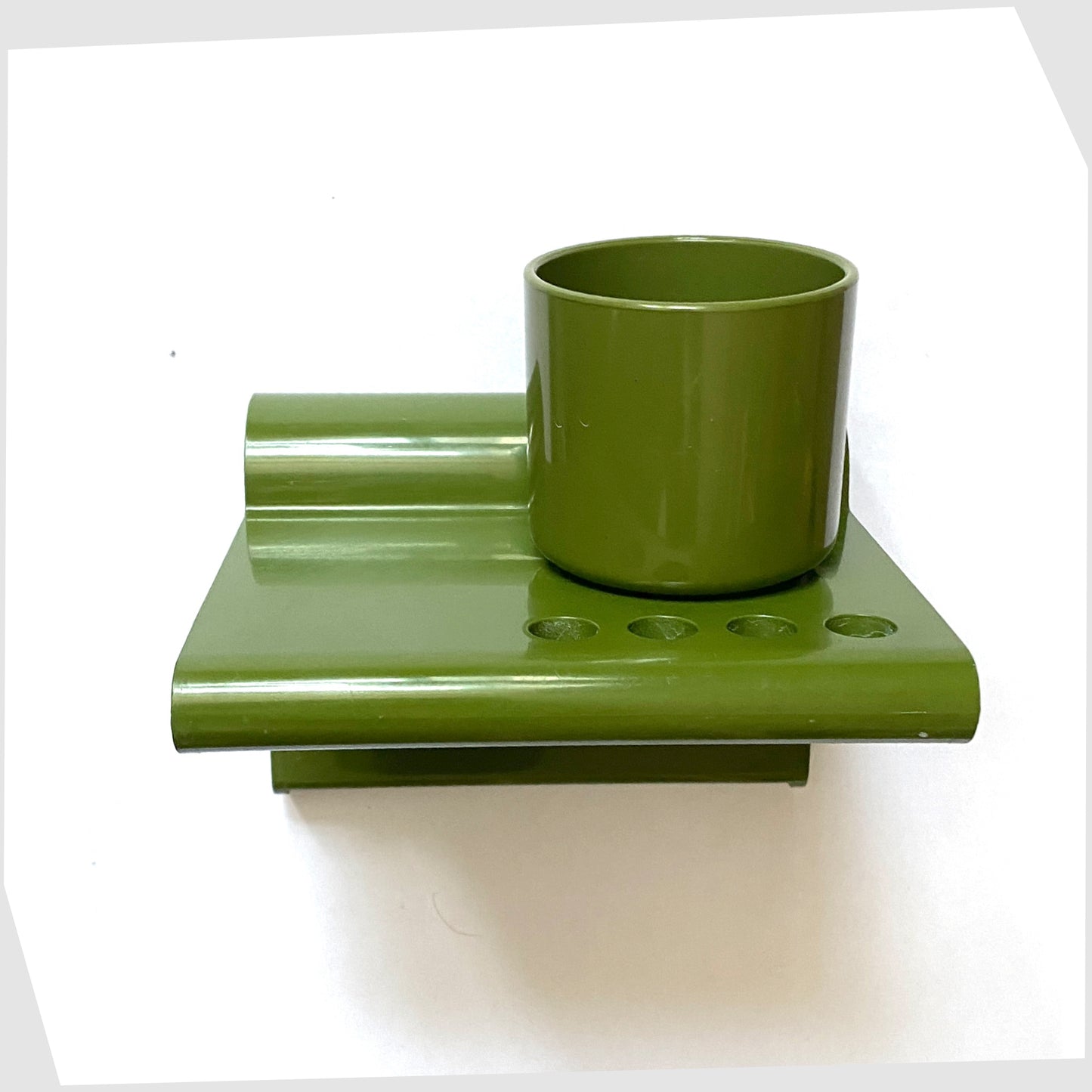 wall mounted Crayonne Toothbrush Holder in olive green, designed by Terrnace Conran