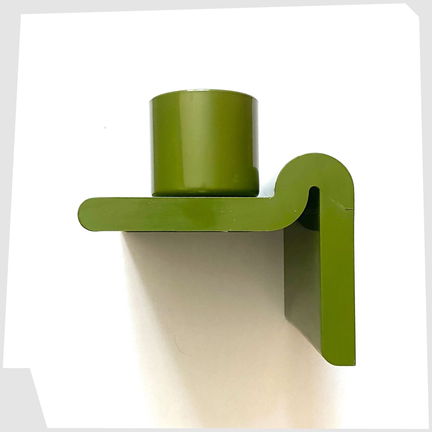 side of the Olive Green Crayonne Toothbrush Holder with original breaker
