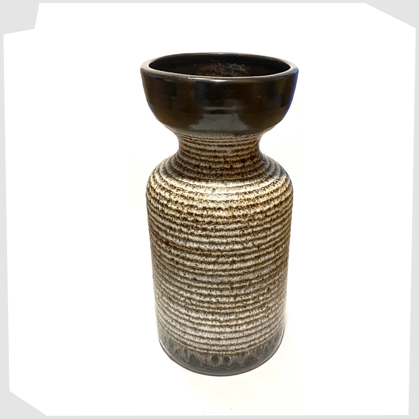top fluted rim of the dumler and breiden 1060/35 vase finished in hoops of brown and beige fat lava