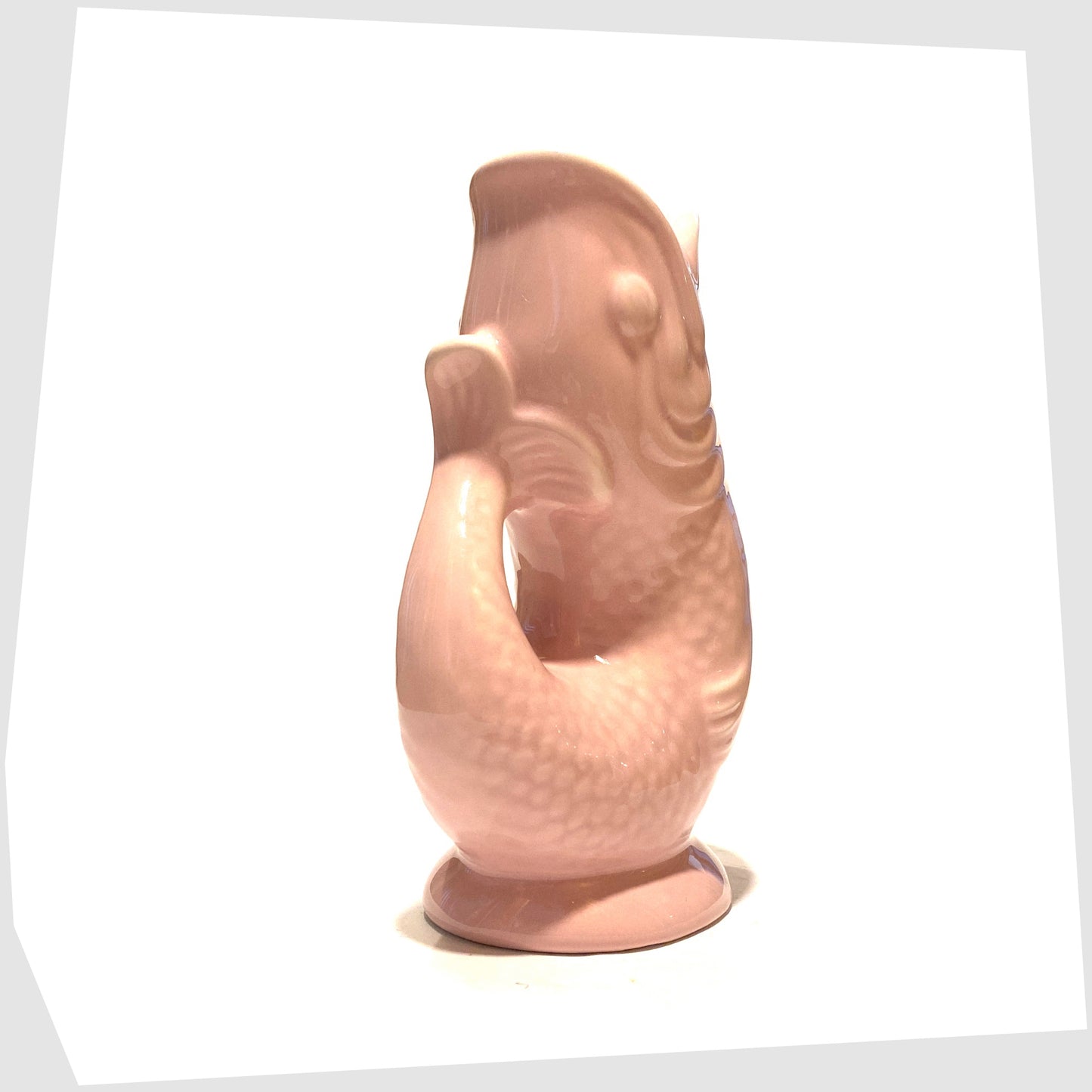 rear tail of the Fish-Shaped Ceramic Vase in pink glaze