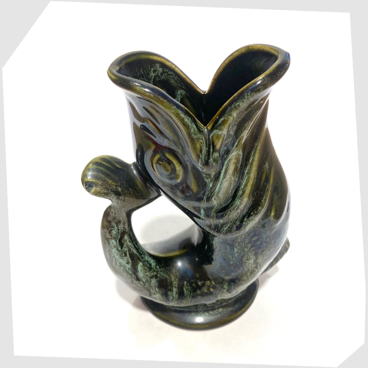 top of the vintage fosters studio pottery gluggle jug in green drip glaze