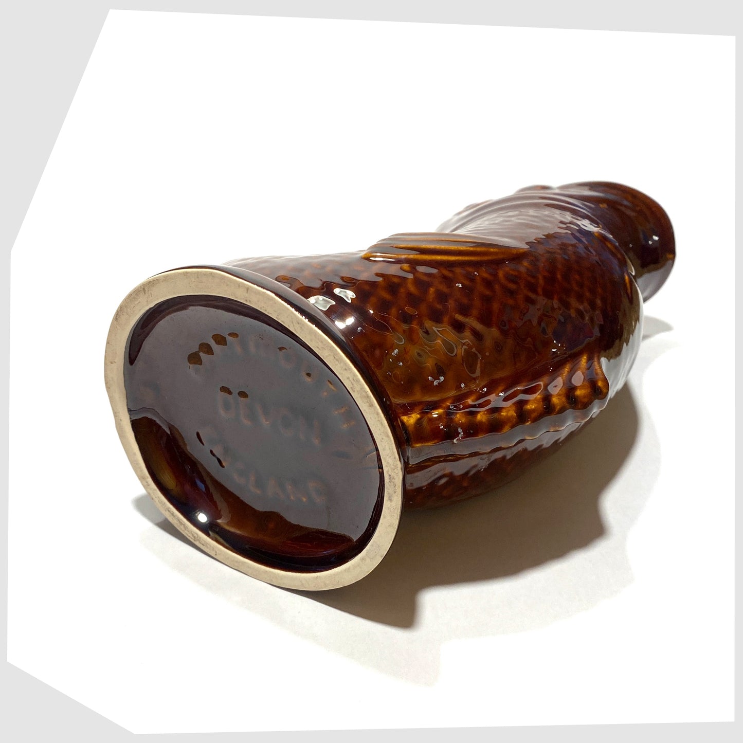 base of the vintage Dartmouth Pottery Gluggle Jug in chestnut brown glaze