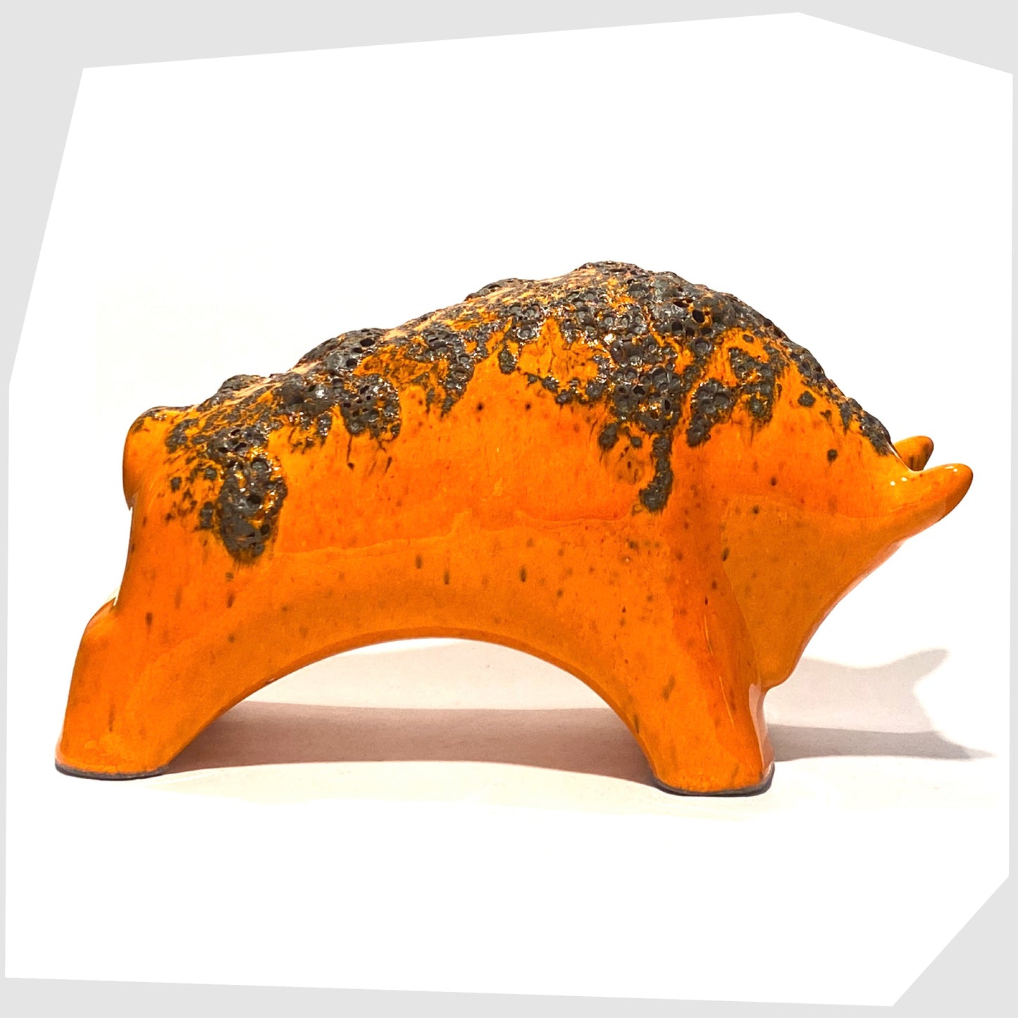 large otto keramik bull in vivid orange with fat lava stripe along the spine