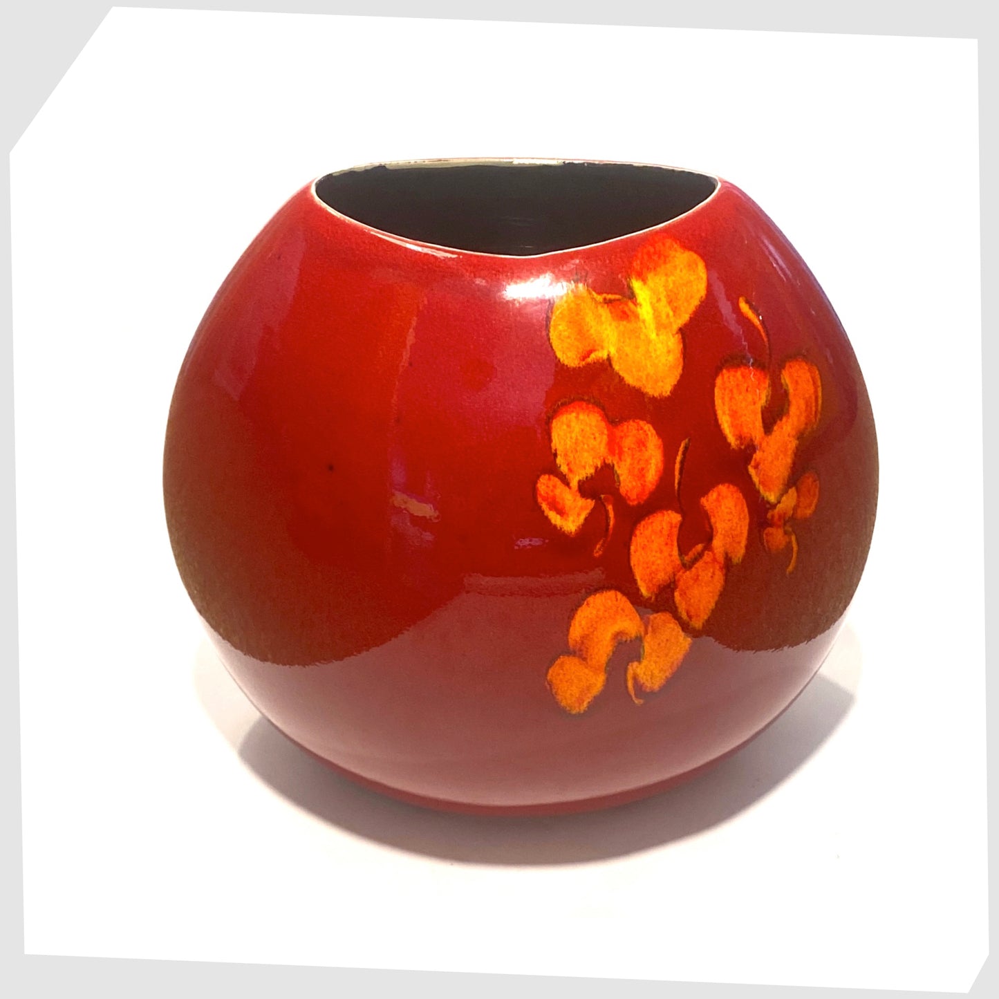 large poole pottery purse vase in red with orange floral design, top rim