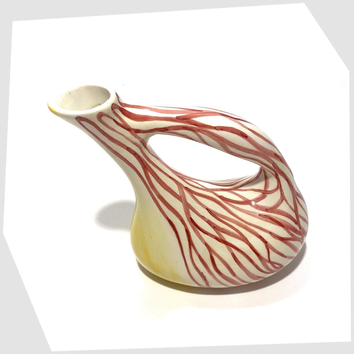 top of the Lux Marmaca Italian Pottery Pitcher in a yellow and white glaze with hand drawn red lines