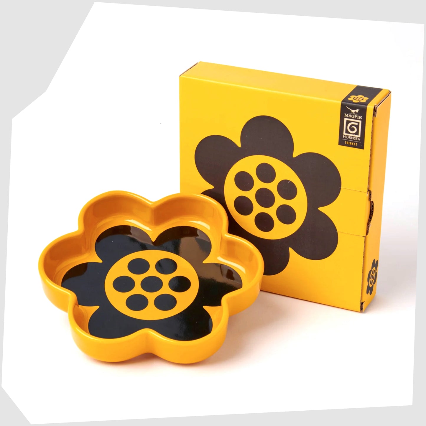 Magpie X Hornsea Flower Trinket Tray, flower shaped trinket tray in yellow glaze with stylised black geo flower design, shown with its gift box packaging