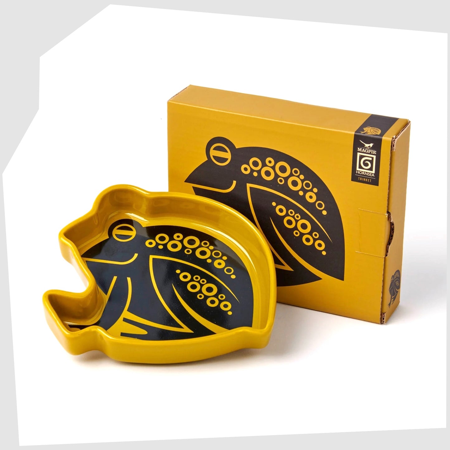 Magpie x Hornsea Frog Trinket Tray, yellow ceramic tray featuring a black frog illustration, shown with its gift box packaging