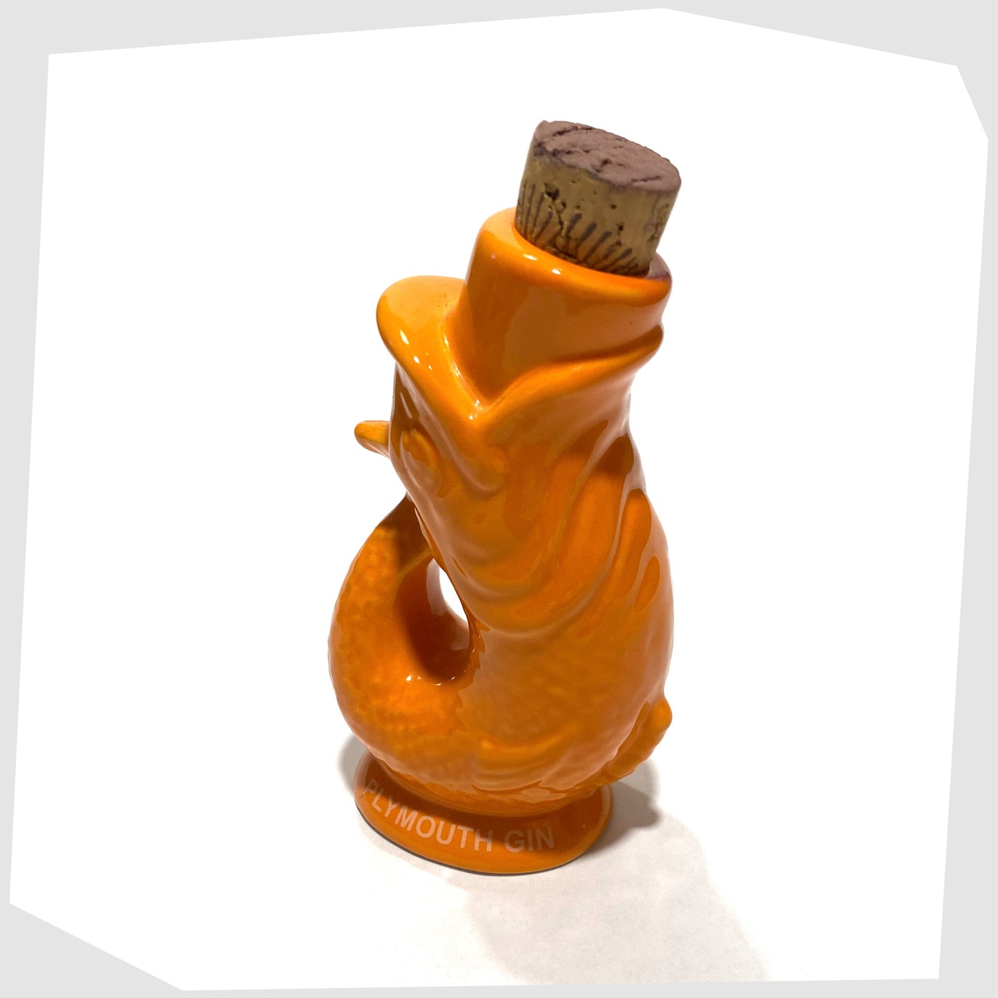 plymouth gin mini gluggle jug in vibrant orange glaze with cork stopper