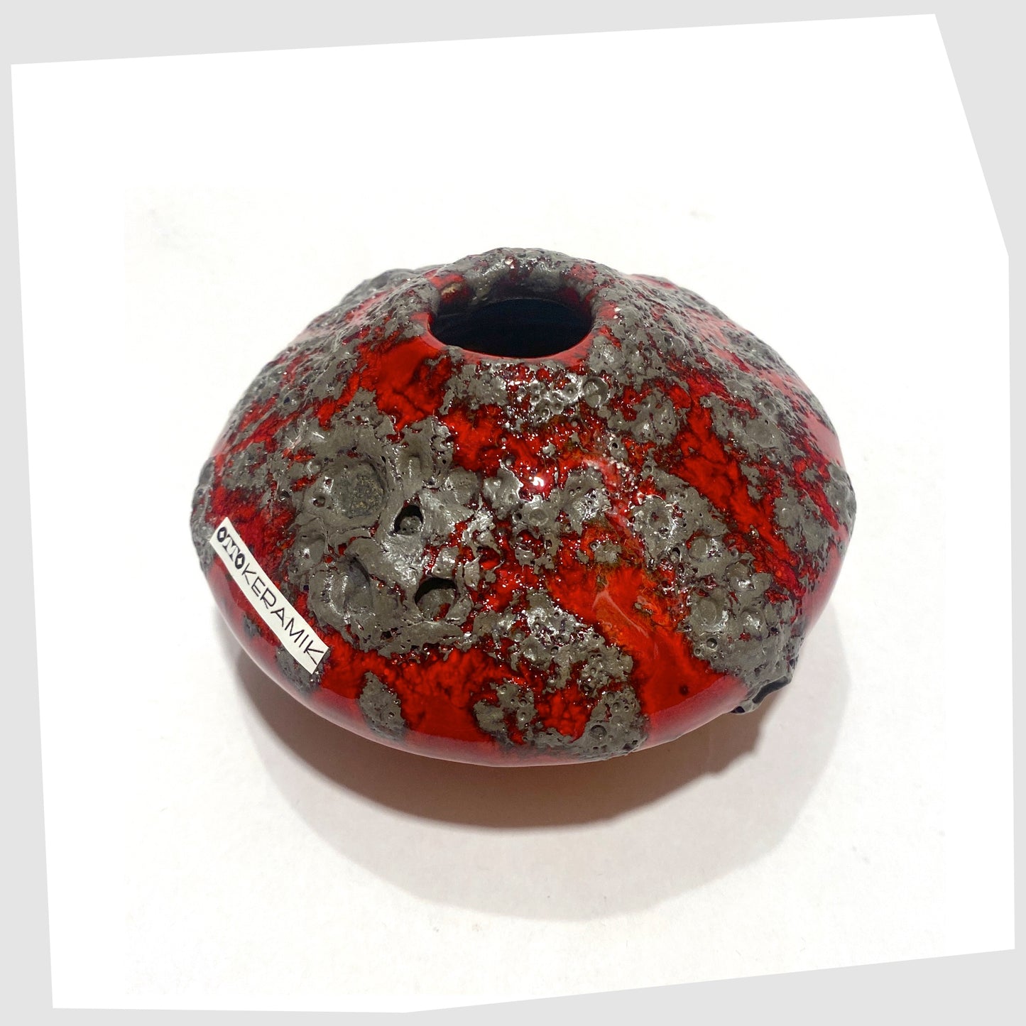 Top of the Otto Keramik 203S Vase in rich red with textured fat lava glaze