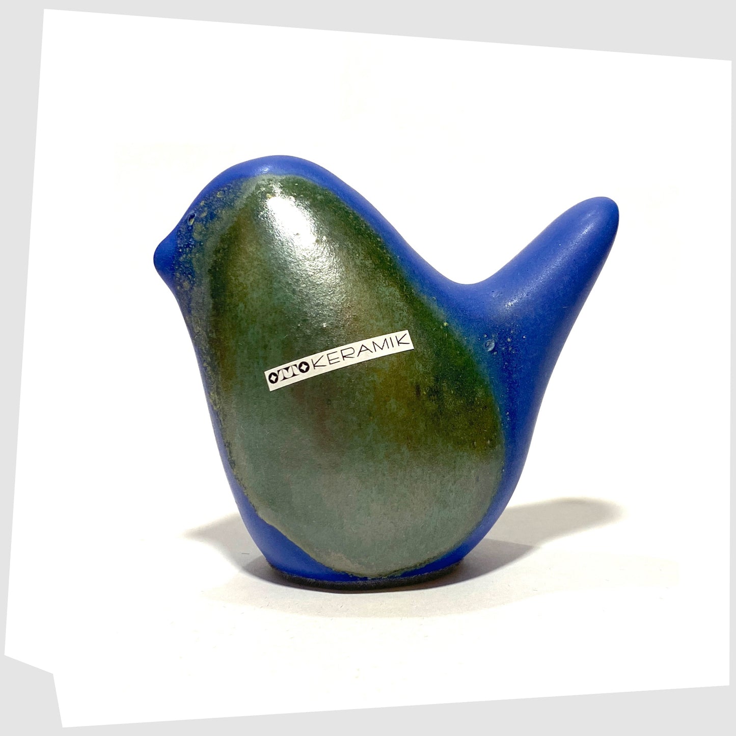 otto keramik ceramic bird in matte blue and gloss sea green glaze