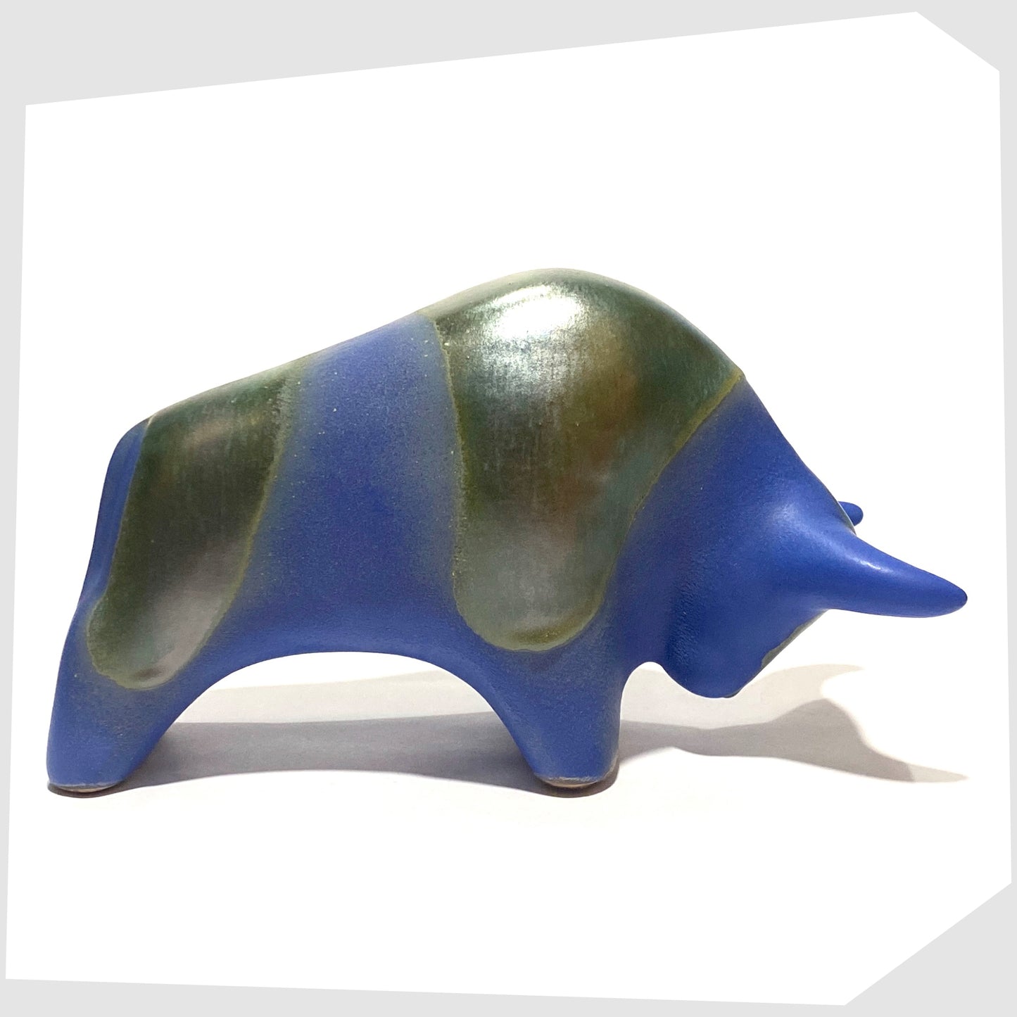 ceramic bull sculpture by otto keramik, germany, glazed in a matte blue with two bands of gloss sea green glaze