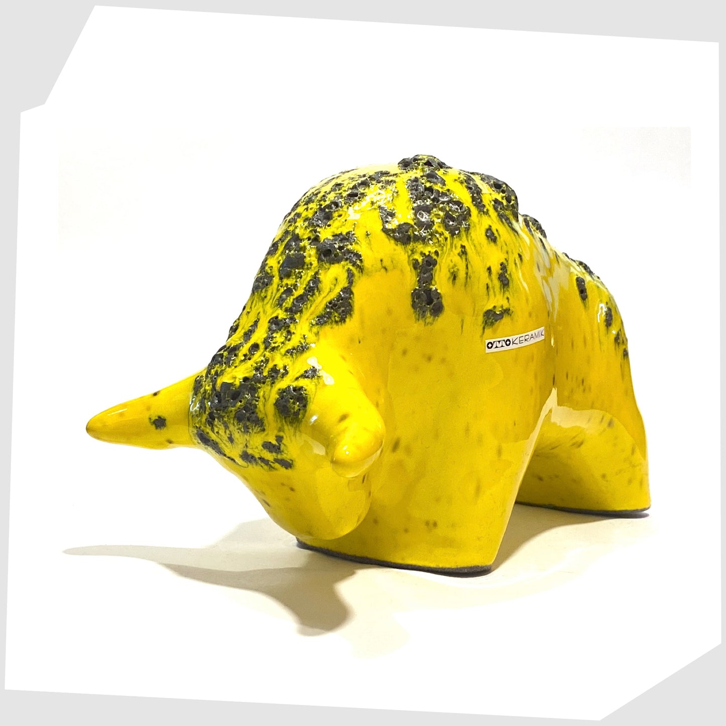otto keramik ceramic bull in gloss yellow glazing with grey fat lava along the spine