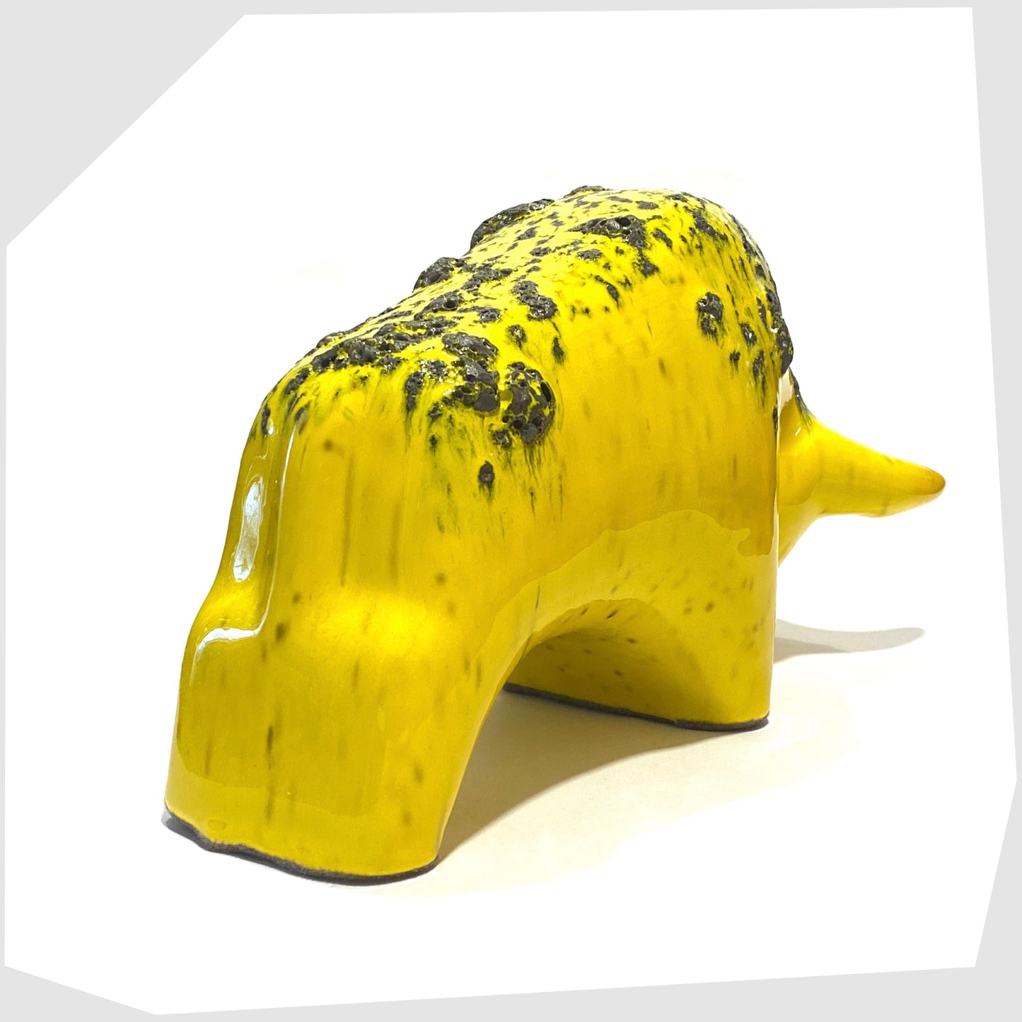 fat lava glazing on the gloss yellow glazed ceramic bull ornament by otto keramik, germany