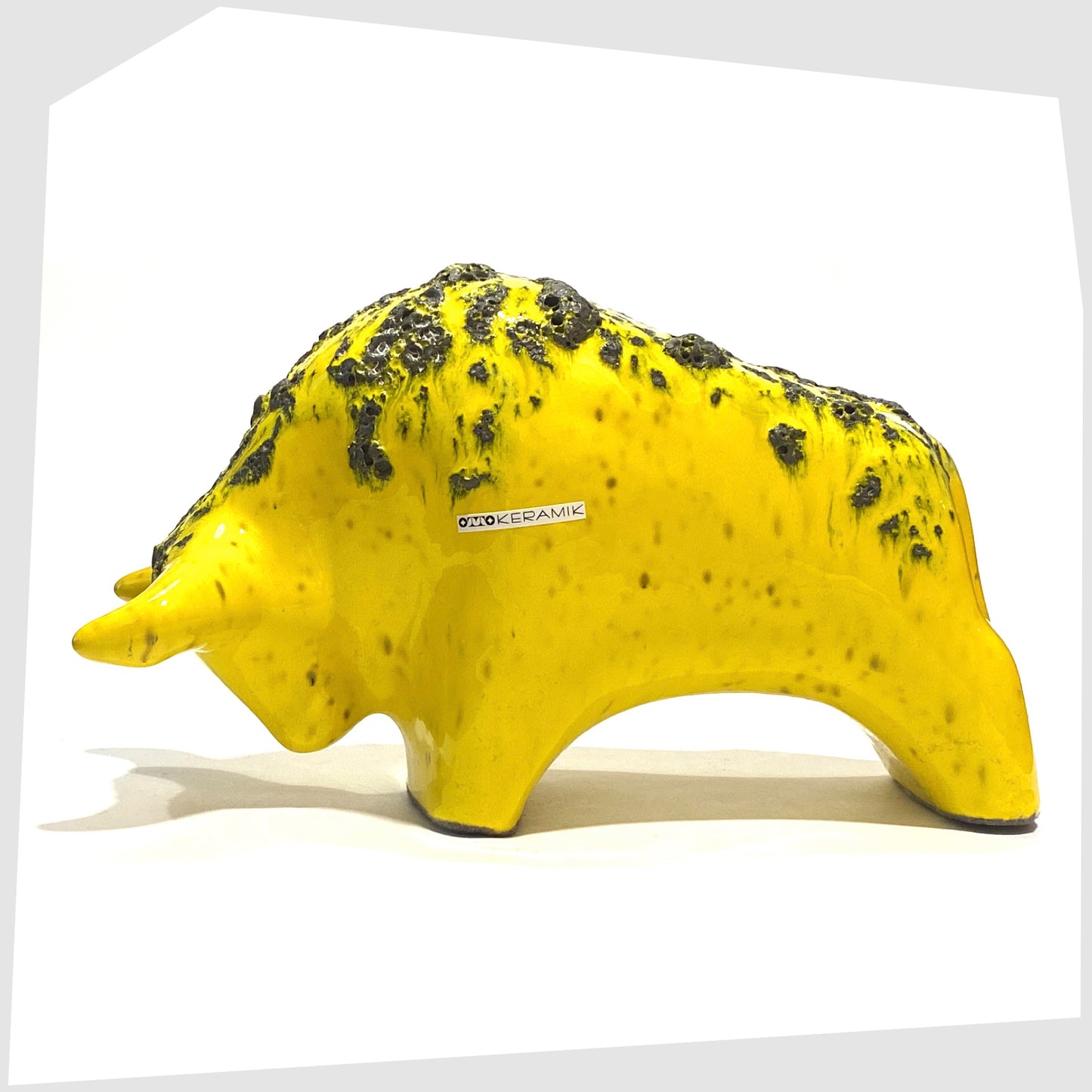 otto keramik ceramic bull ornament in gloss yellow glaze with fat lava glazing