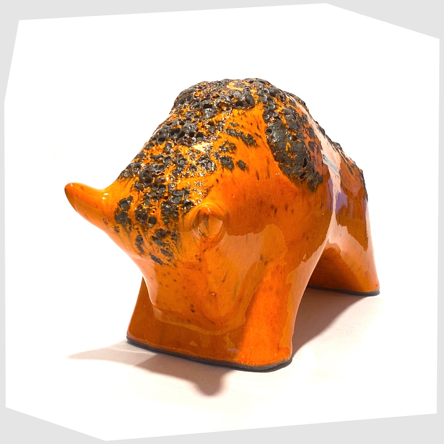 front horns on the large otto keramik bull in vivid orange with fat lava stripe on the rear