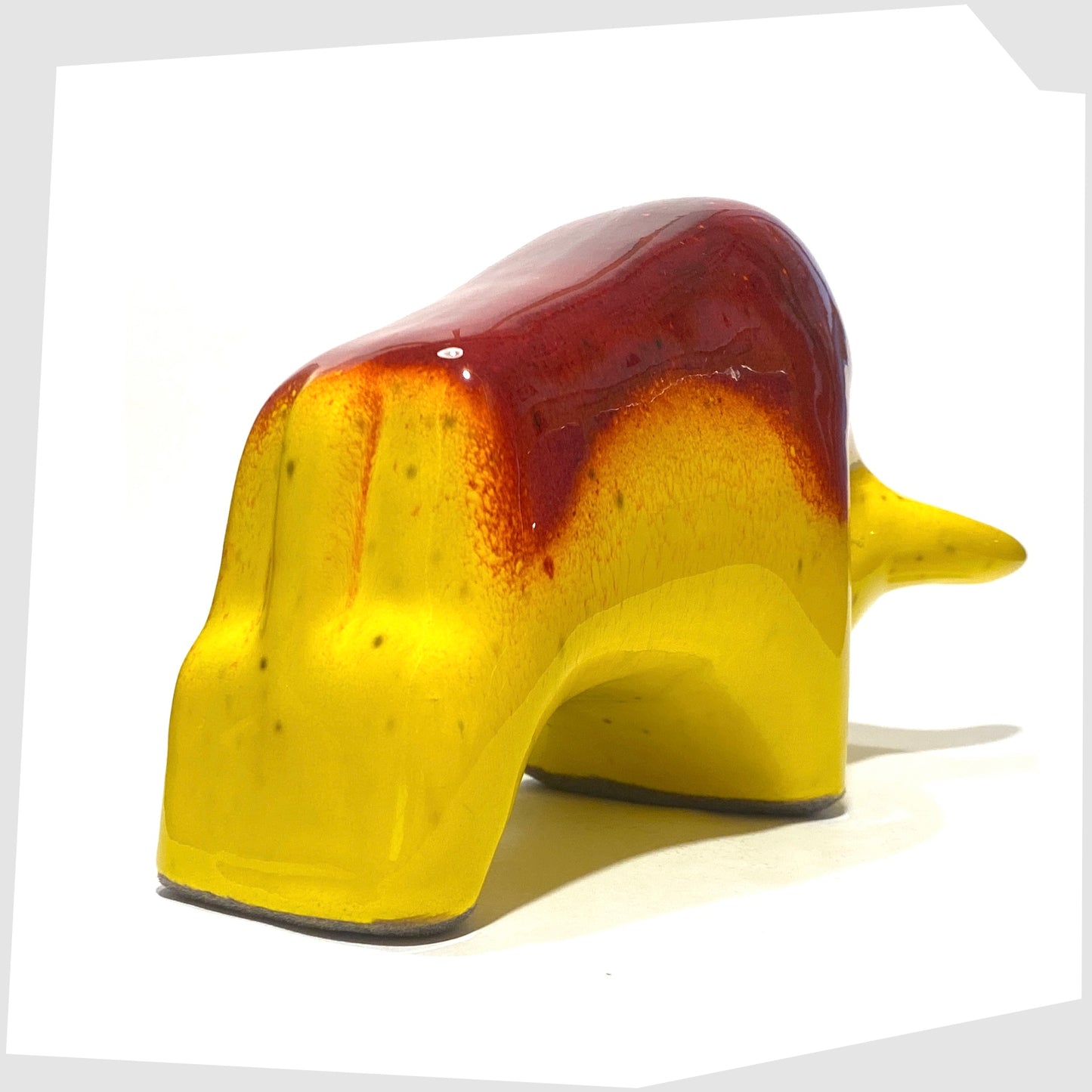 rear of the red over yellow glazed otto keramik bull
