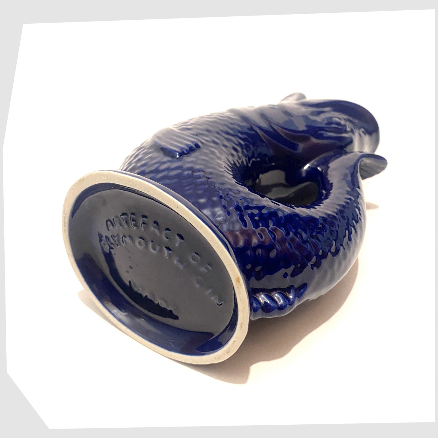 base mark of the artefact of plymouth gin gluggle jug made by wade ceramics