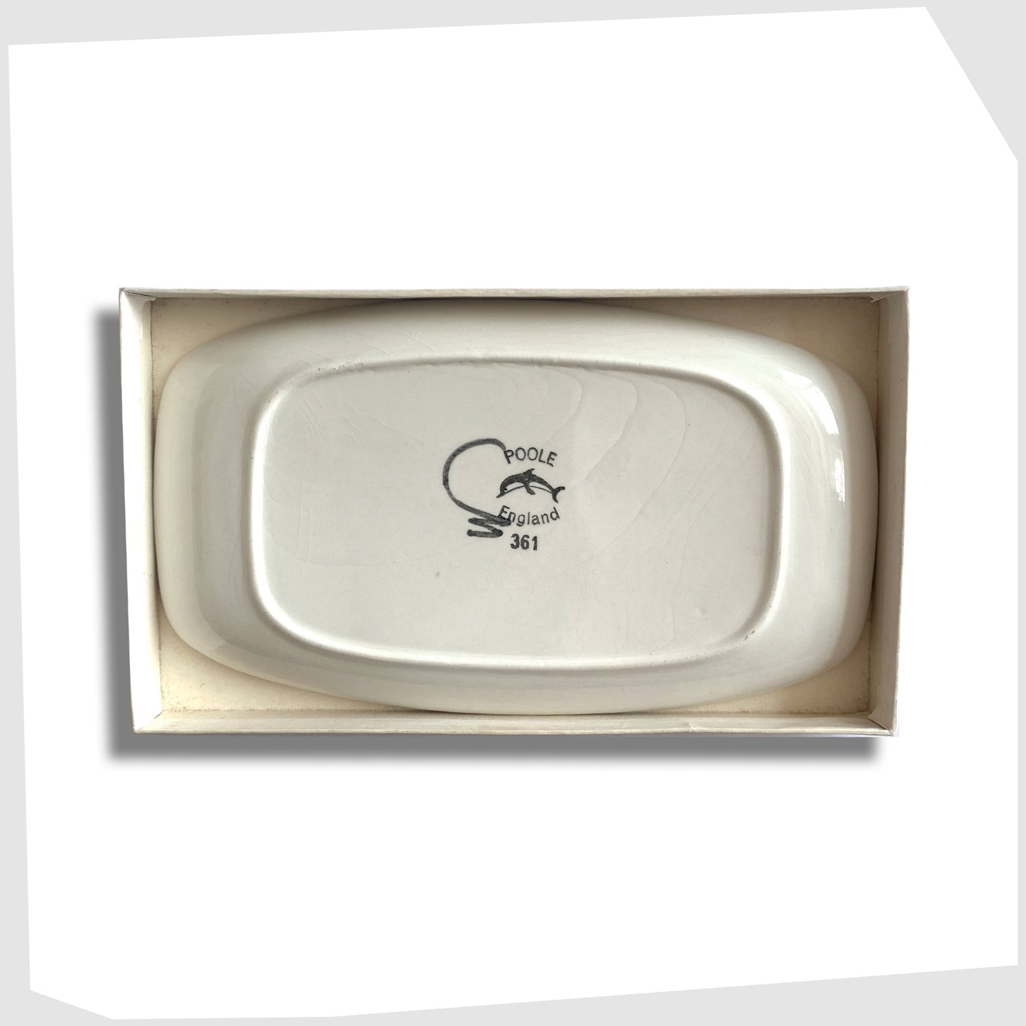 rear stamp of the poole pottery delphis pin dish, shape 361, in a rich orange glaze with flowing forms of red green and yellow