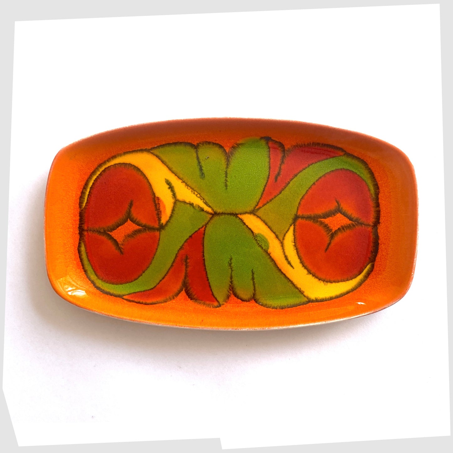 poole pottery delphis pin dish, shape 361, in a rich orange glaze with flowing forms of red green and yellow