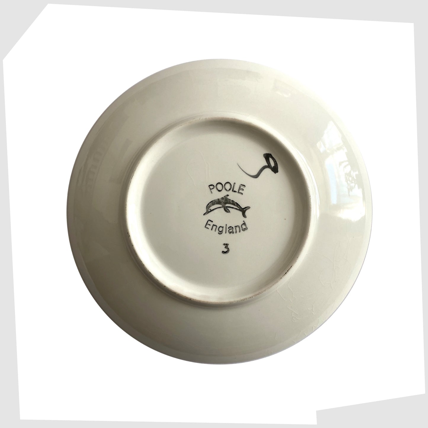 rear of the Poole Pottery in the Delphis glaze of red with orange and green forms