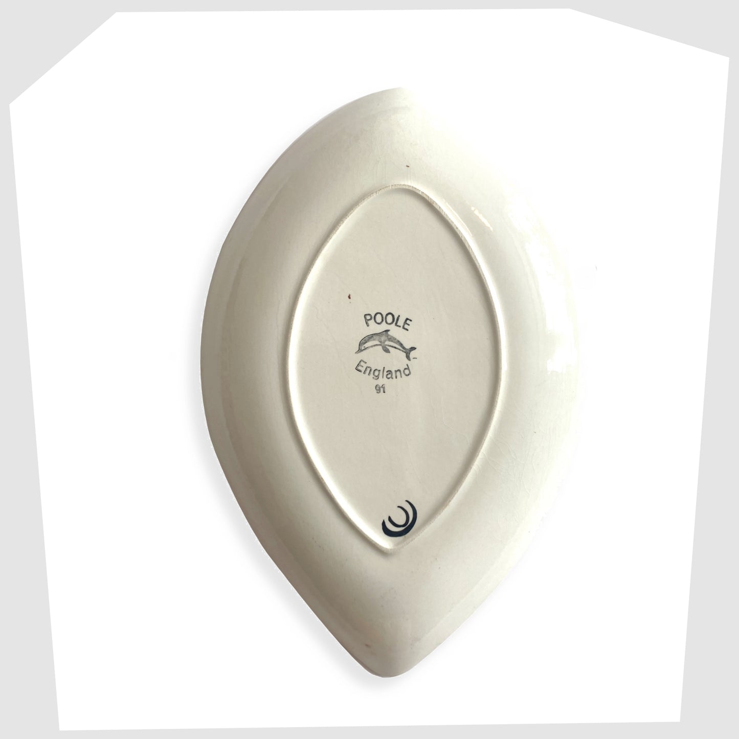 rear markings on the poole pottery shape 91 dish by carole cutler