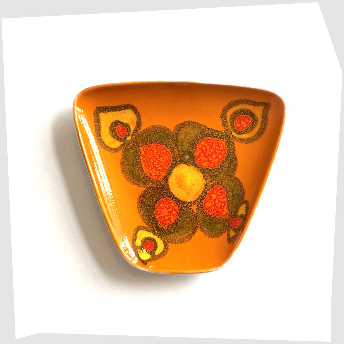 vintage poole pottery delphis sweet dish, model 81, glazed in a vivid orange with yellow and red pattern