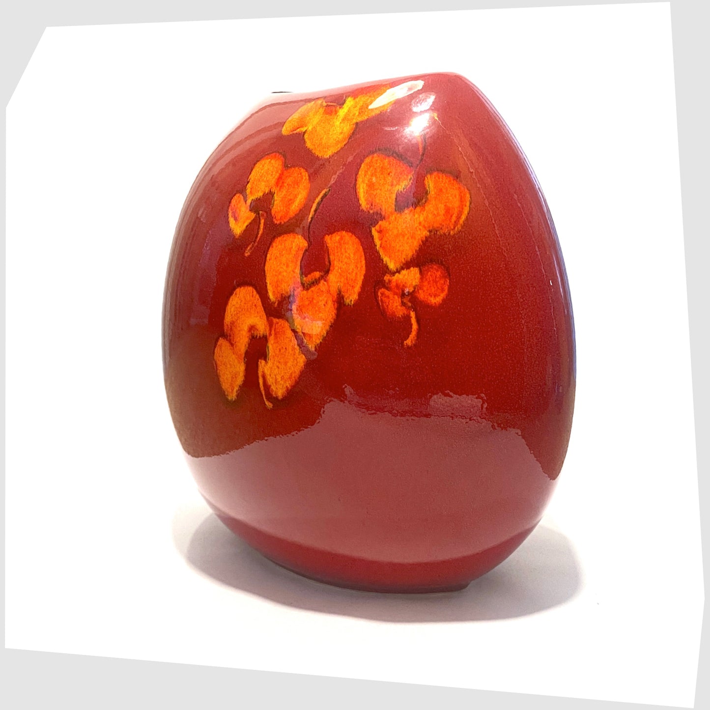 poole pottery large purse vase in red with orange floral design