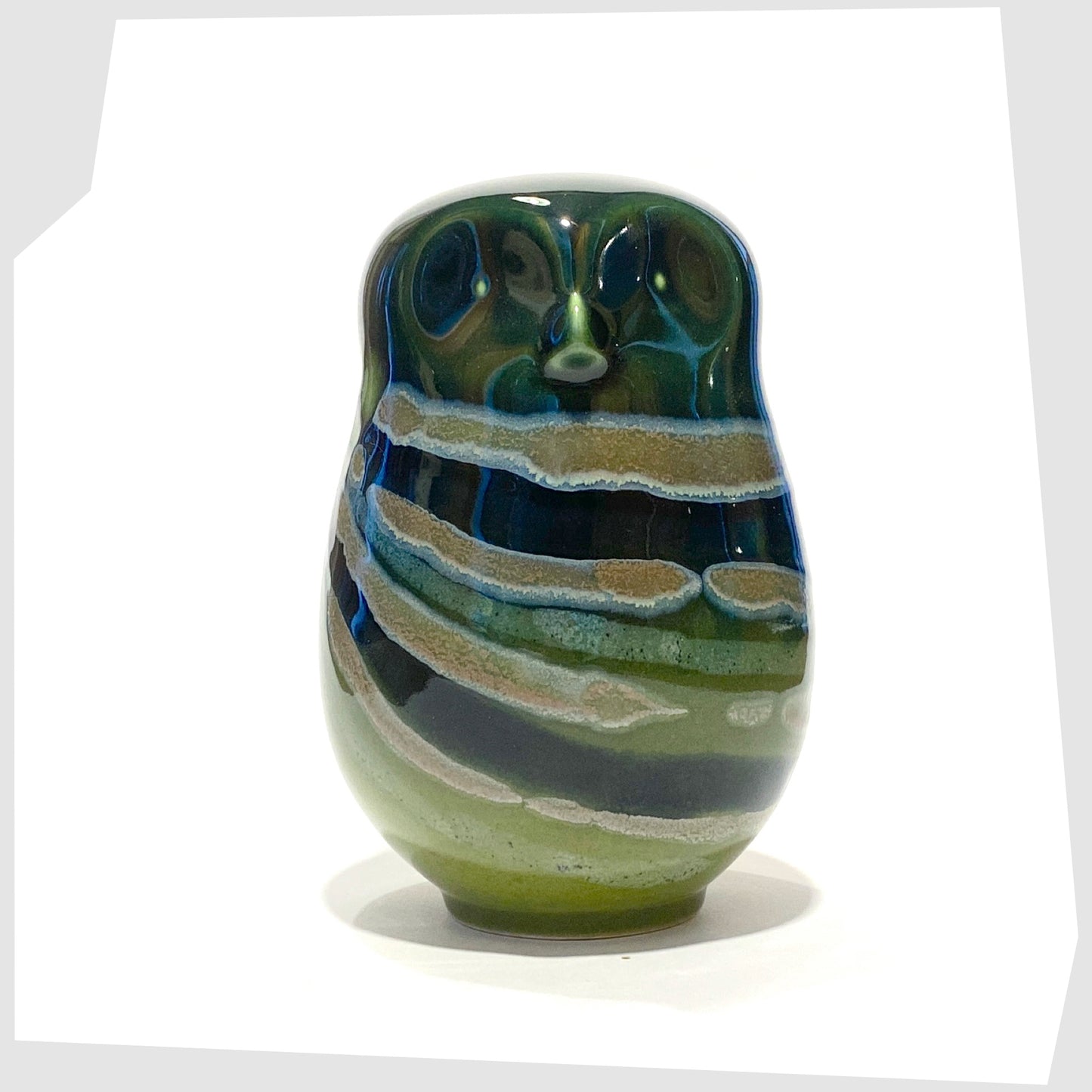 large poole pottery owl ornament glazed in the Maya finish of green, blue and warm grey