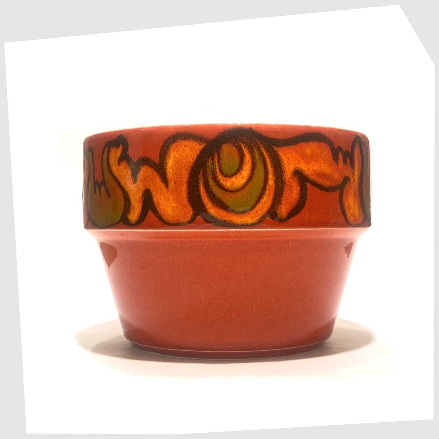 Poole Pottery Red Delphis Planter finished in a rich red glaze with orange and green forms around the rim
