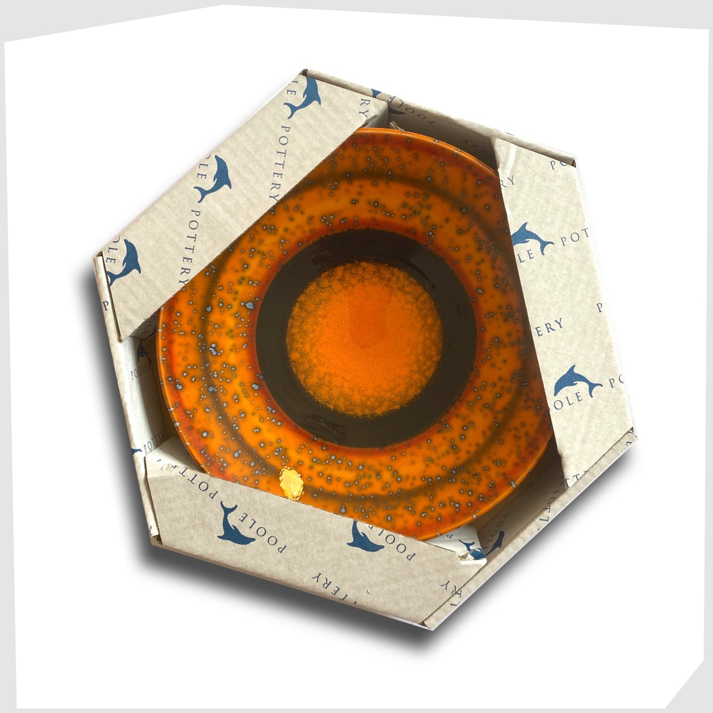 poole pottery decorative Saturn plate designed by Alan Clarke shown in its presentation box