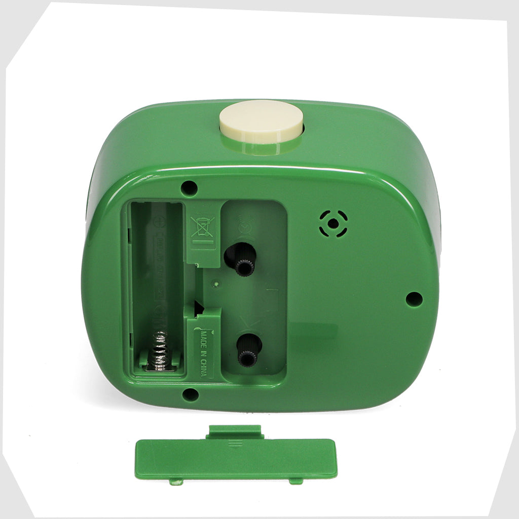 back of the Green Retro Alarm Clock, by Rex London, showing its adjusting dials and battery compartment