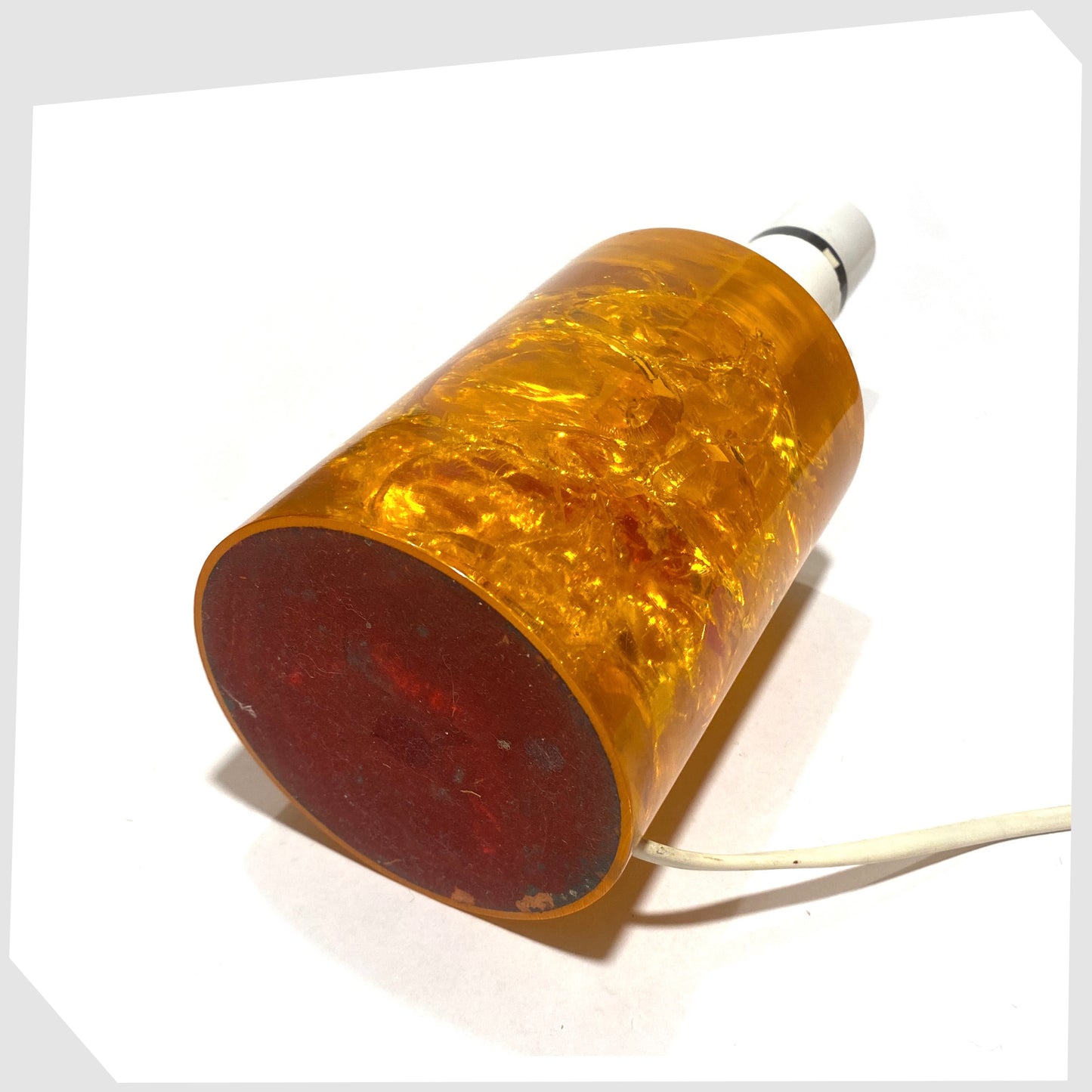 base of the Vintage Shattaline Table Lamp in a gorgeous orange resin colour way