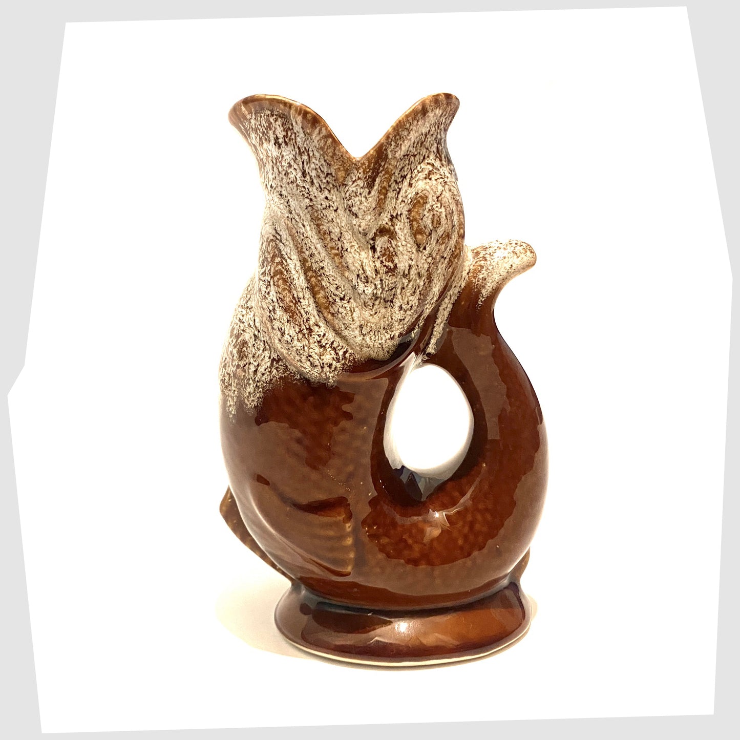 vintage studio pottery gluggle jug in brown colourway with honeycomb glazed top