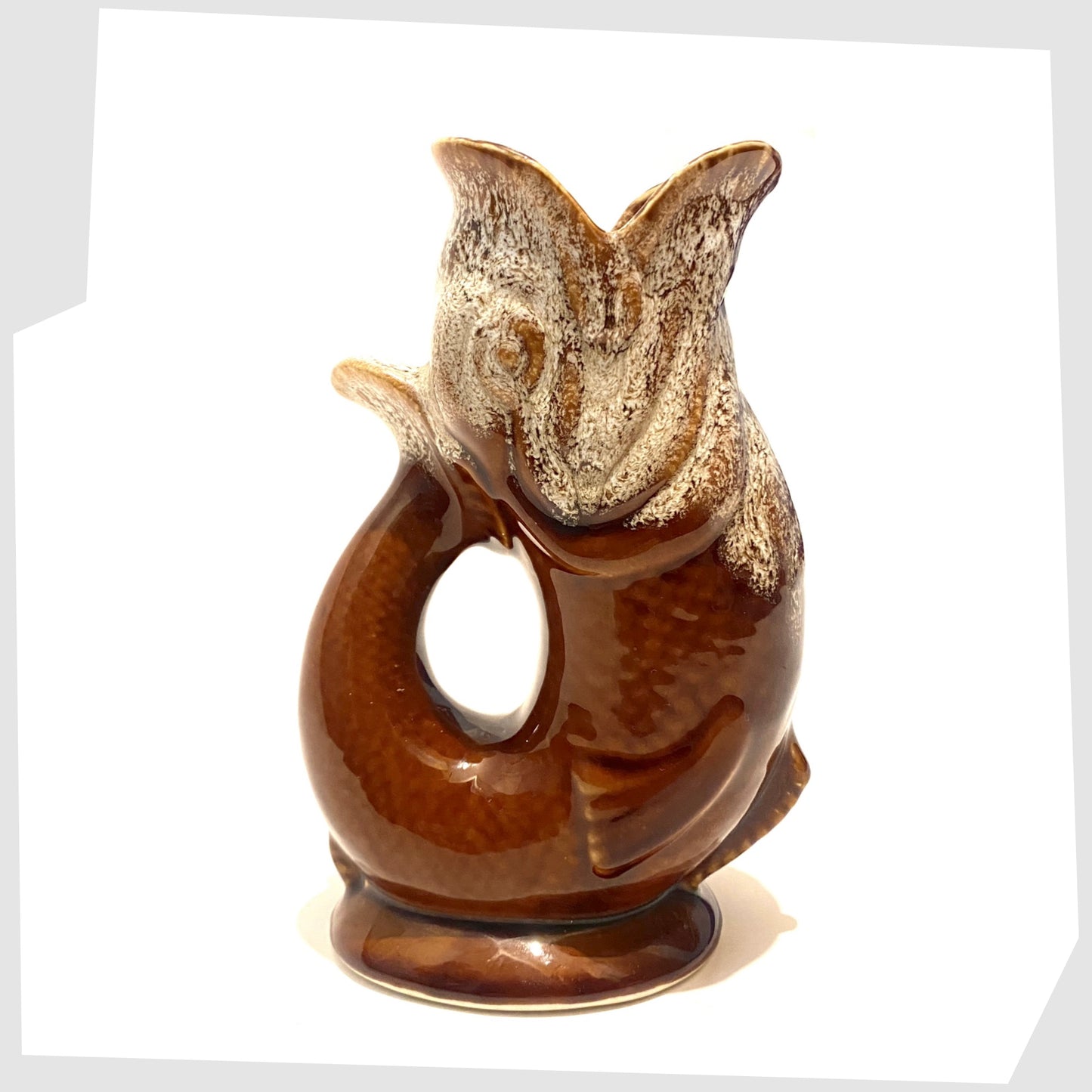 vintage studio pottery gluggle jug in chestnut brown with honeycomb glazed top