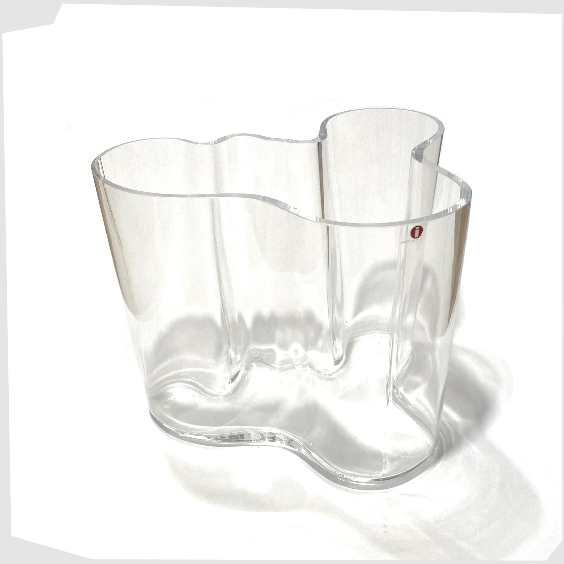 large iittala savoy vase designed by Alvar Aalto, clear glass vase with iconic waved edge, 160mm in size complete with original 'i' label on the front rim