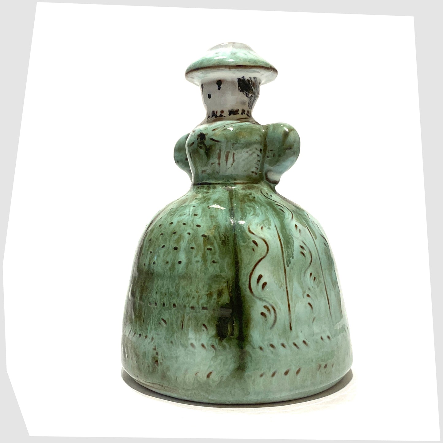 figurative ceramic candleholder in green and white glaze by Gudrun Baudisch-Wittke at Hallstatt Keramik, Austria