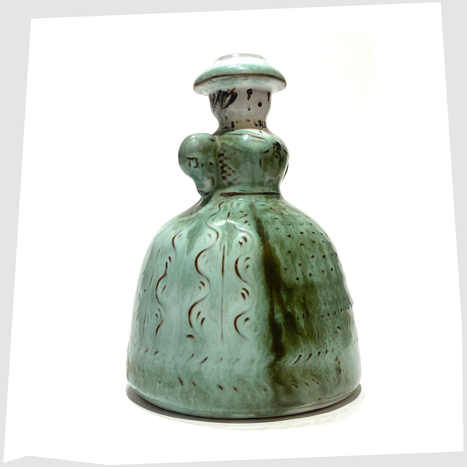 figurative ceramic candleholder in the shape of a woman with a flowing dress by Gudrun Baudisch-Wittke at Hallstatt Keramik, Austria