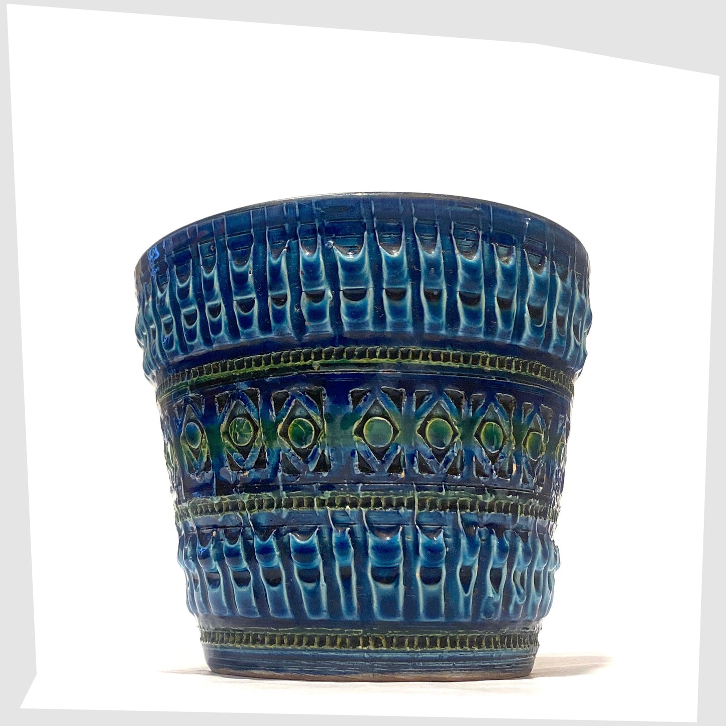 Italian Pottery Planter in a rich Rimini Blue-inspired glaze with textured impressed patterns, shown on a white background