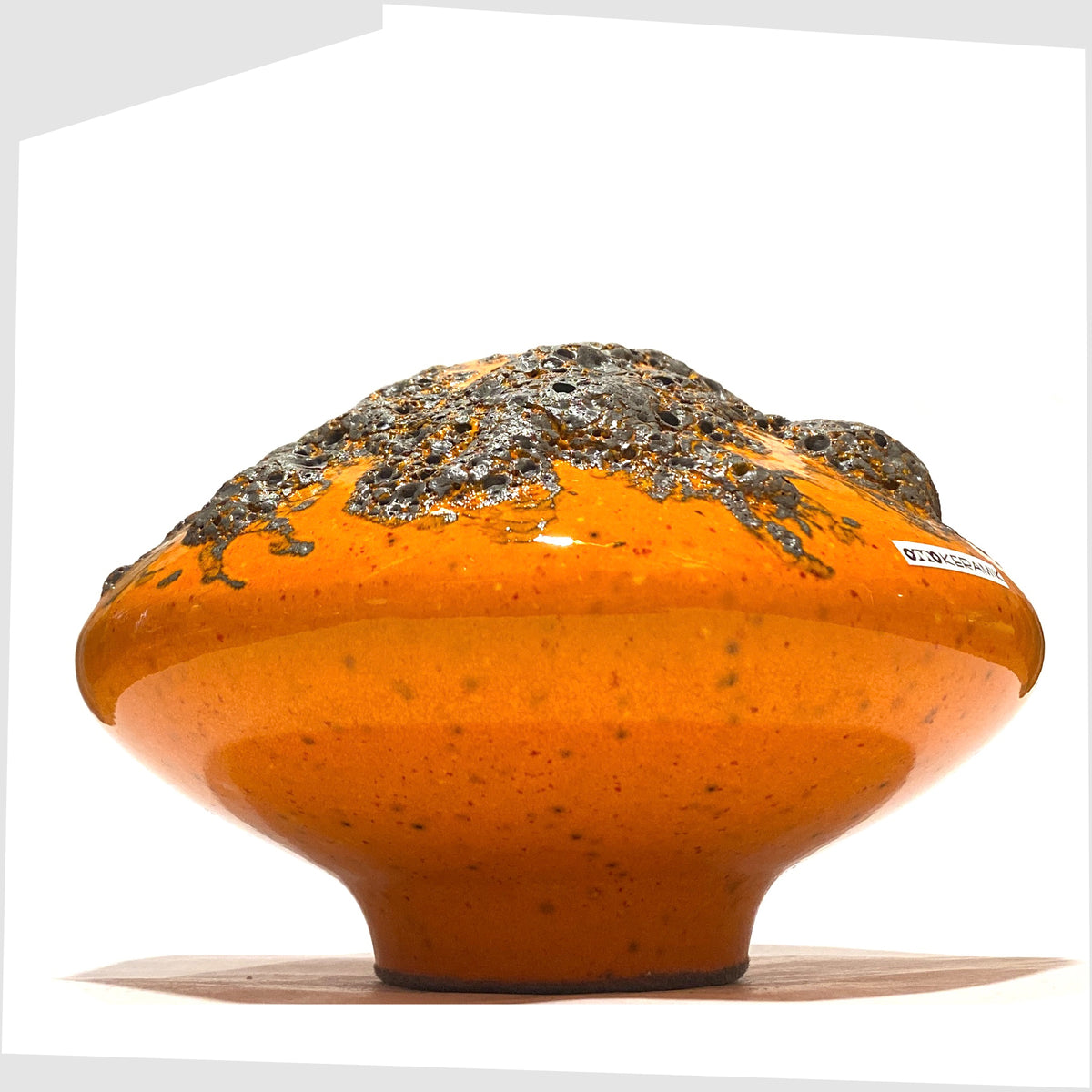 West German Pottery-style Otto Keramik Vase, model 203, in a vibrant orange glaze with grey fat lava, shown on a white background