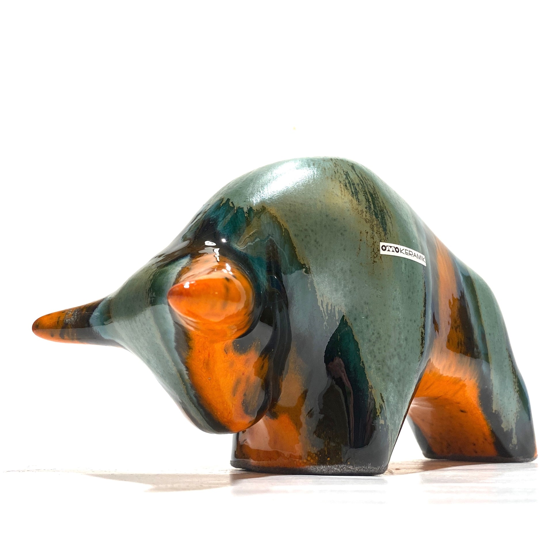 Otto Keramik Bull in Peru glaze of orange and sea green bands