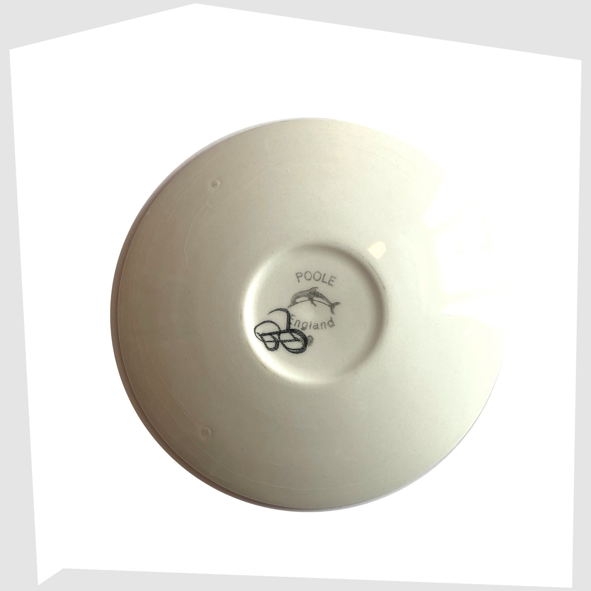 Rear of the Poole Pottery Delphis Pin Dish, shape 49, by Janet Laird, shown on a white background