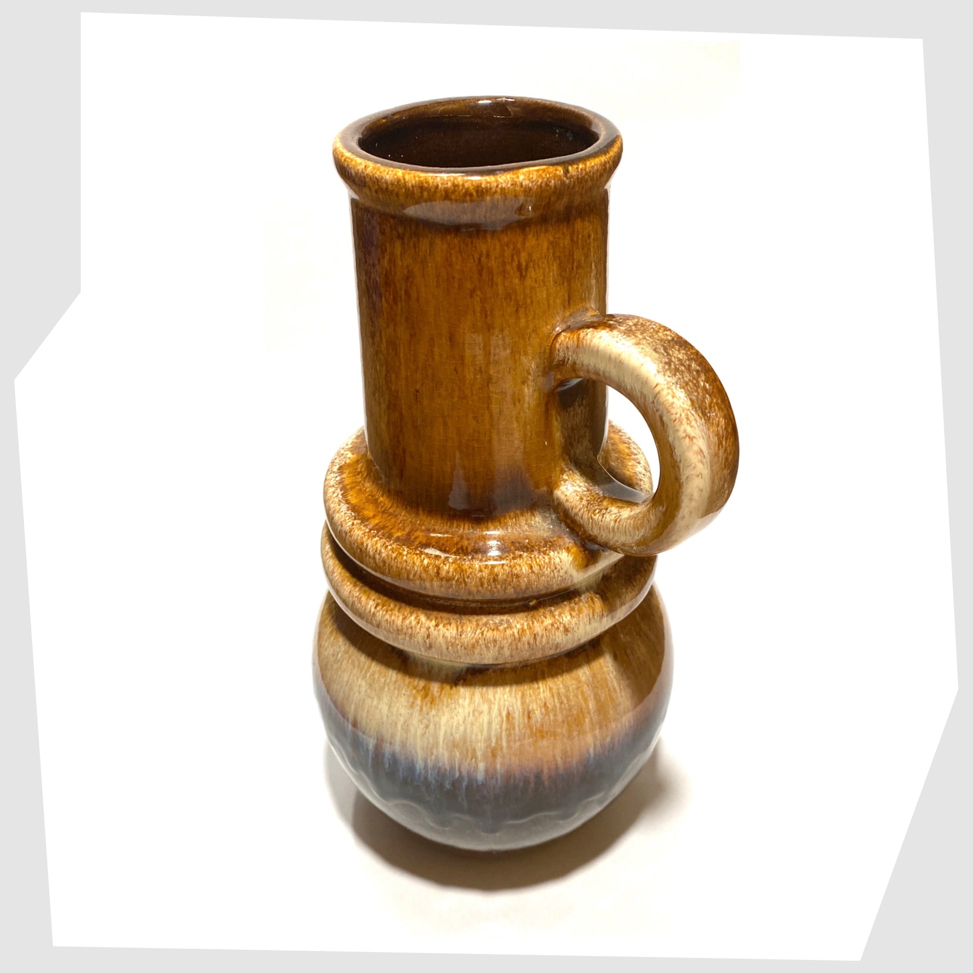 top rim of the scheurich keramik 428-26 vase in beige and brown glaze with tints of blue 