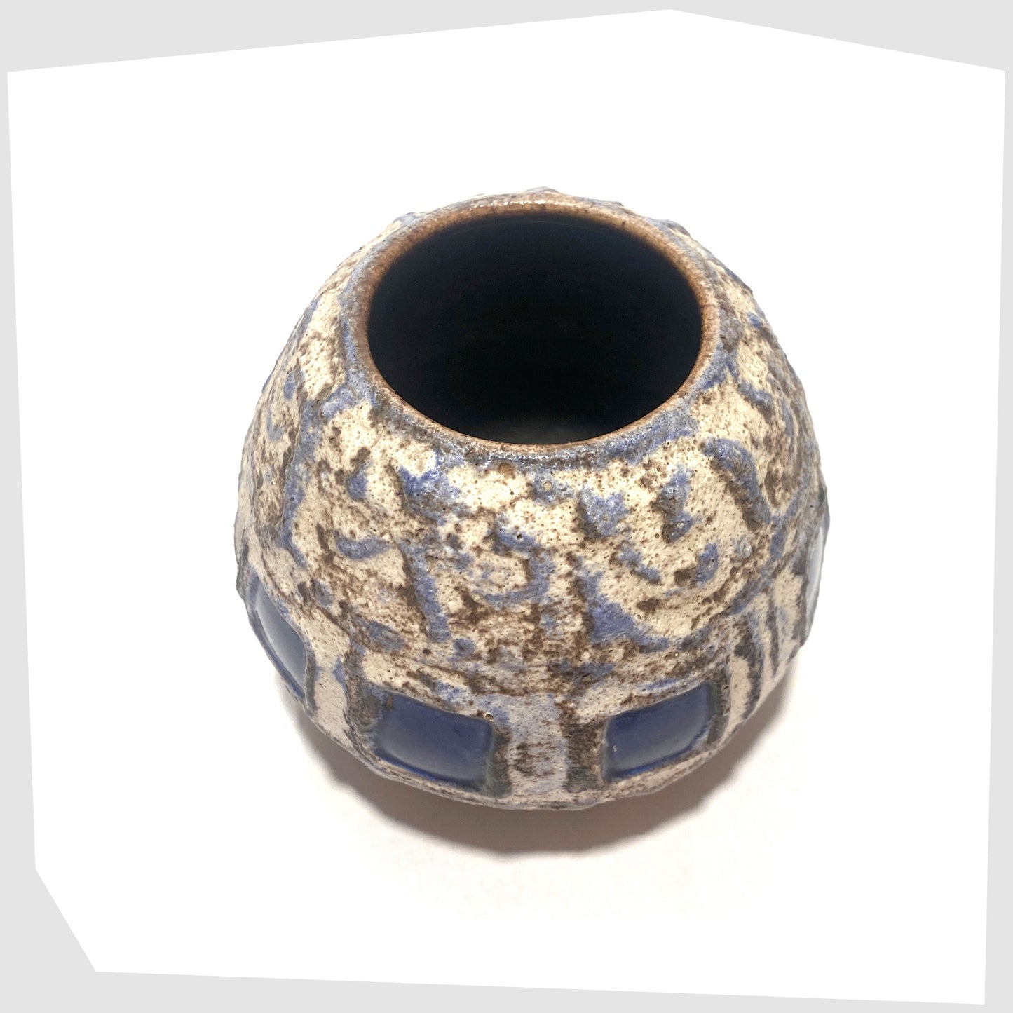 top of the Schlossberg Keramik 259 spherical vase in white fat lava glaze with blue squares