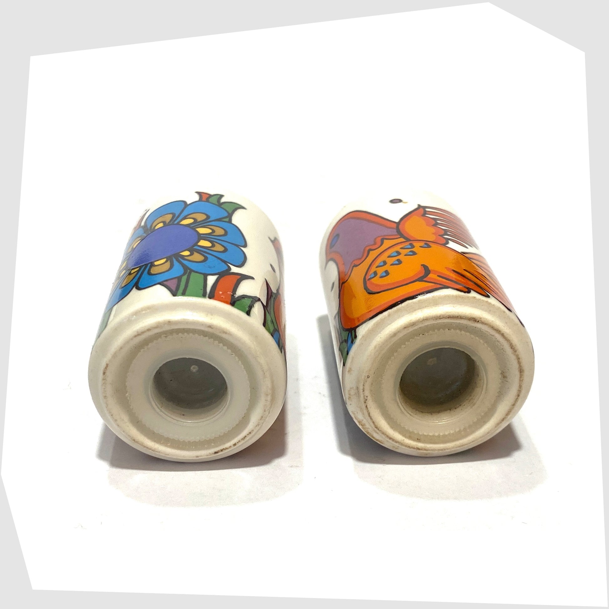 Base of the Villeroy and Boch Acapulco Salt & Pepper Shakers complete with original plastic stoppers, shown on a white background