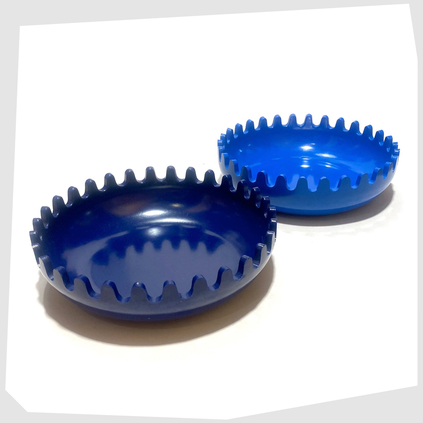 Alan Fletcher Clam Ashtray in Blue and Navy colourway shown open
