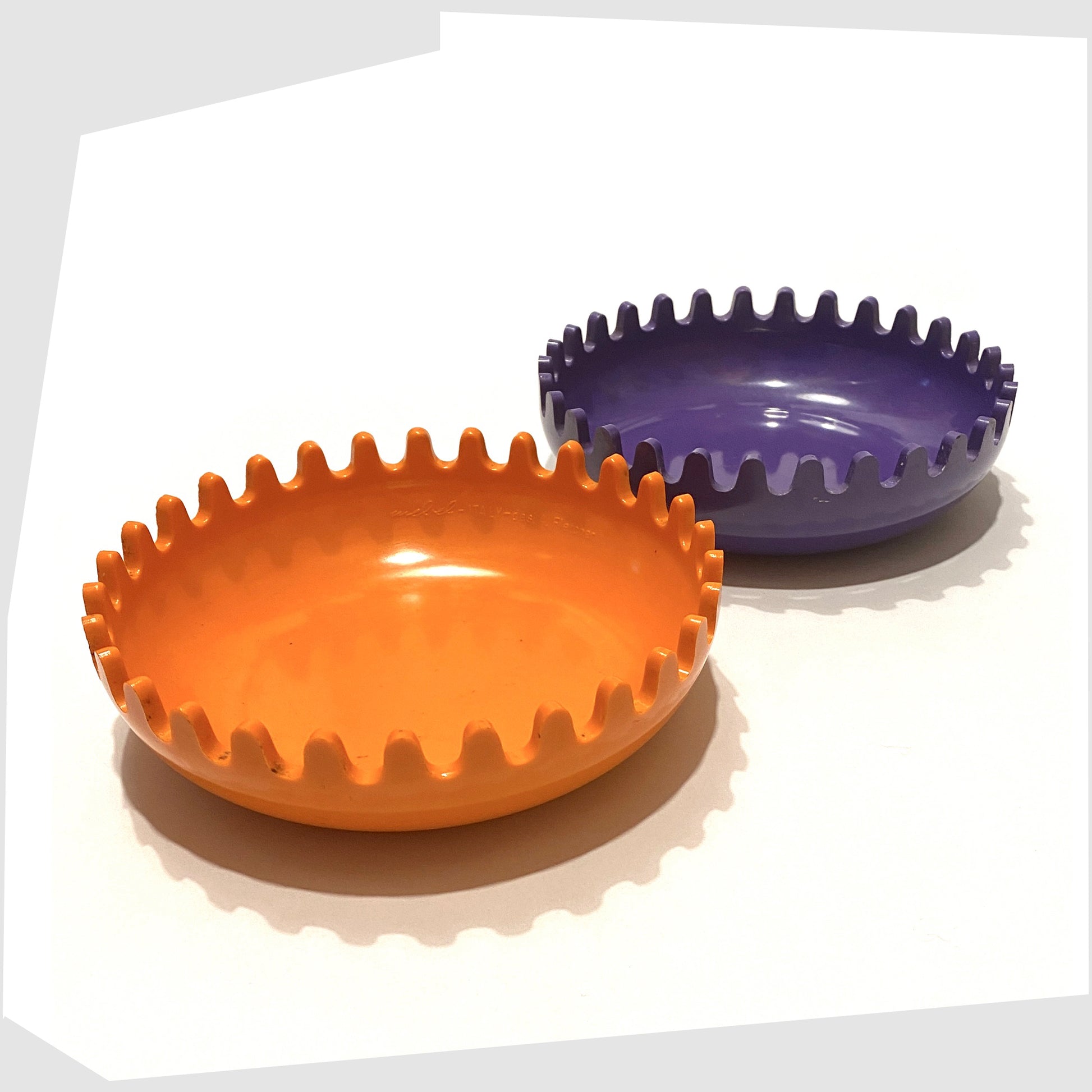 alan fletcher clam ashtray in purple and orange colour way shown open