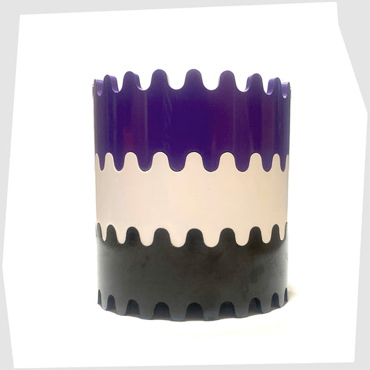 Alan Fletcher Stax Ashtray collection in purple, white and black, shown stacked together