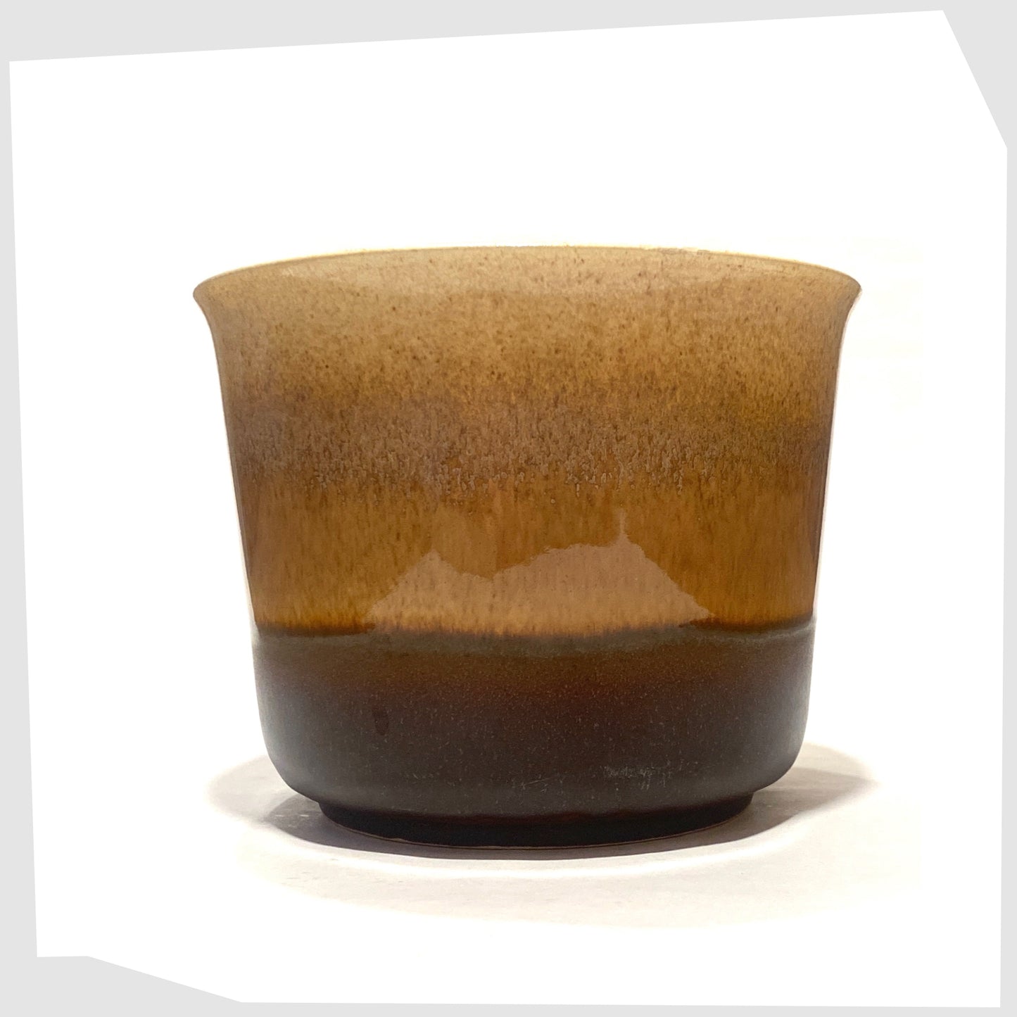 Vintage 1970s Bay Keramik 653-14 Planter in amber and brown glaze, shown on a white background